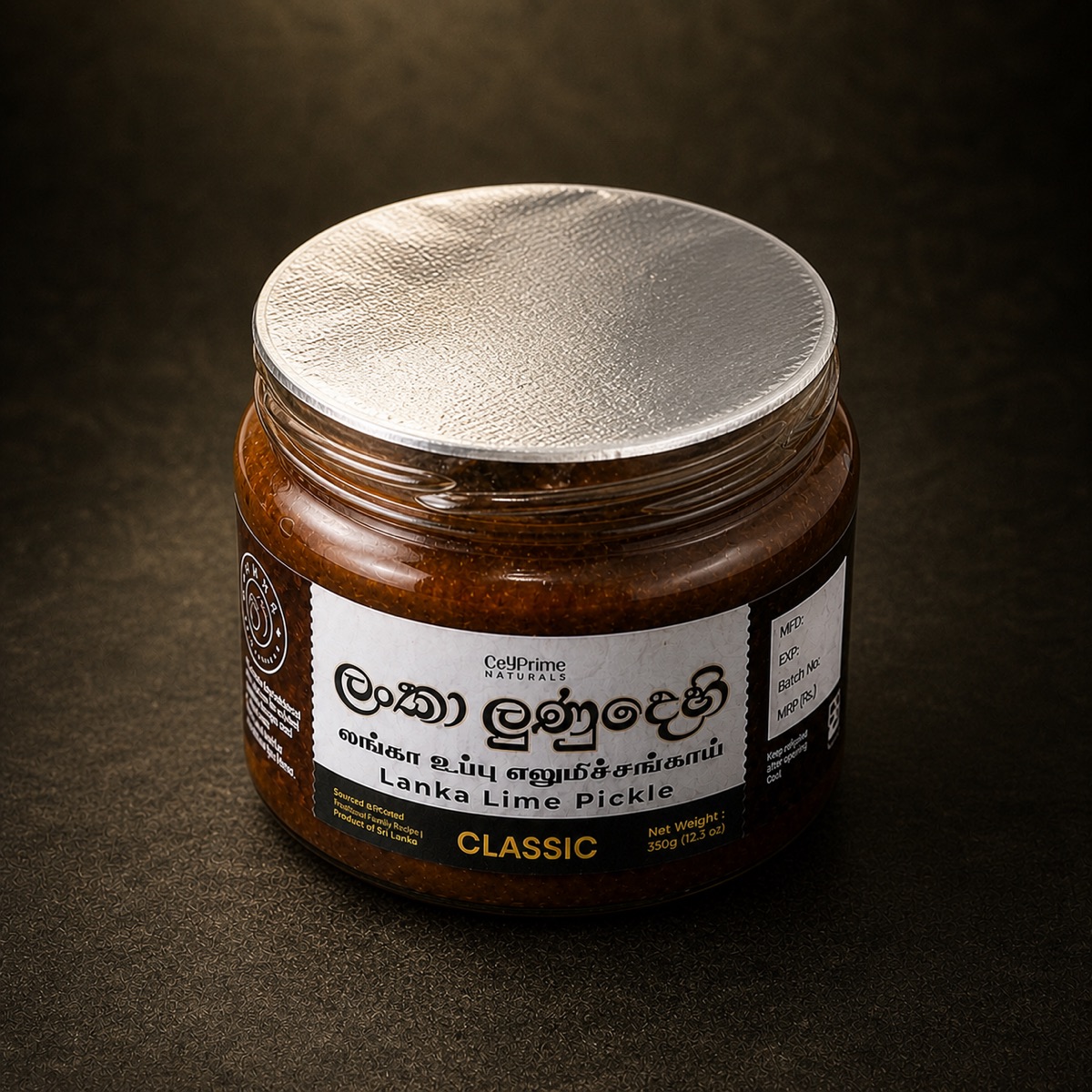 Sealed jar of Classic Lanka lime pickle with foil lid, unopened